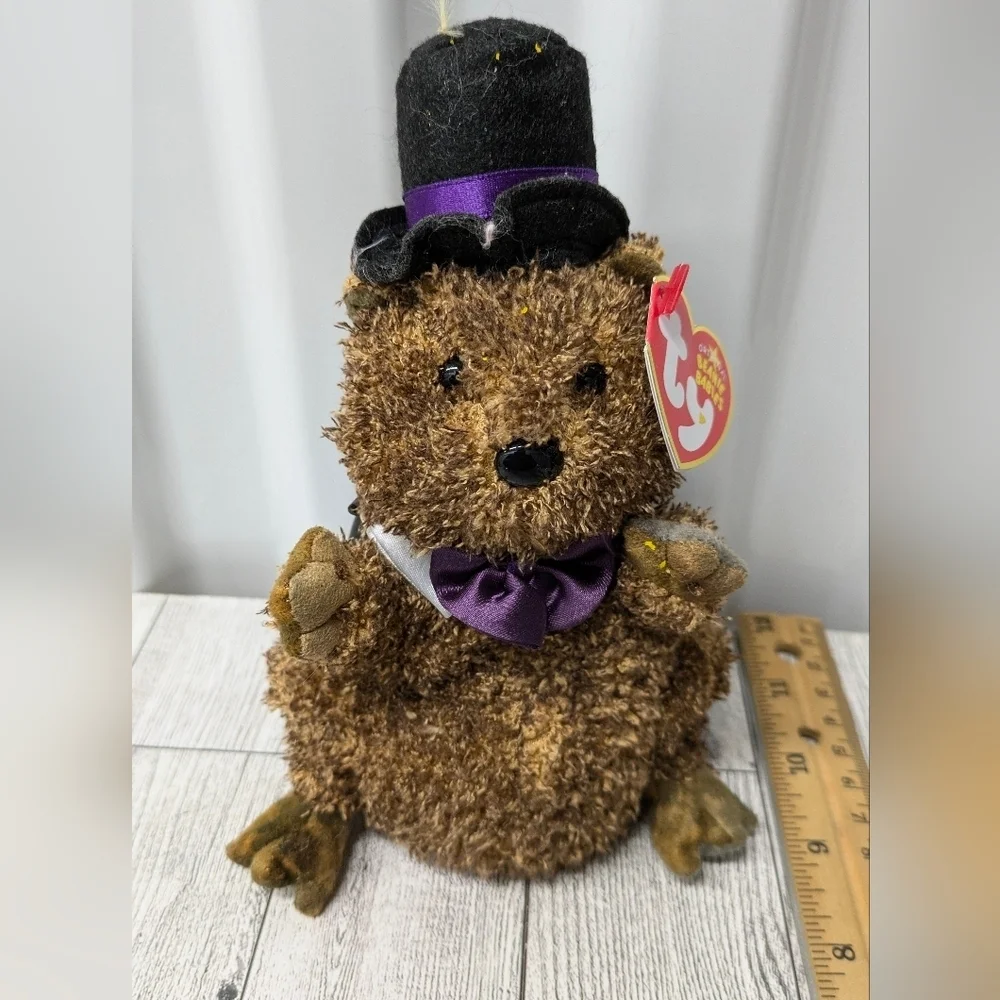 Ty Brown Stuffed Bear with Black Hat and Purple Bow